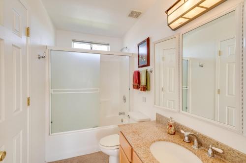 a bathroom with a shower and a sink and a toilet at Magnificent Big River Home with Beautiful Views in Parker