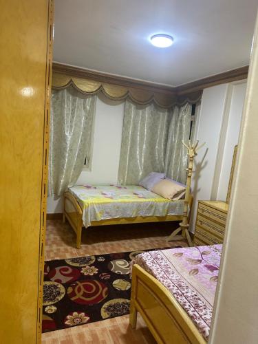 Postel nebo postele na pokoji v ubytování Central flat in the heart of Zagazig