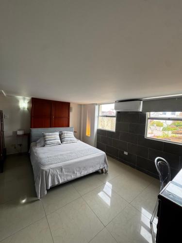 Postel nebo postele na pokoji v ubytování Luxury 2B Duplex in Old City Cartagena