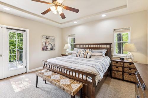 a bedroom with a bed and a ceiling fan at Bitterroot Escape in Whitefish
