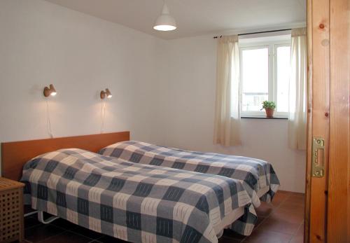 Postel nebo postele na pokoji v ubytování Skönadal B&B