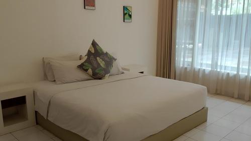 Ένα ή περισσότερα κρεβάτια σε δωμάτιο στο Casavina house 201