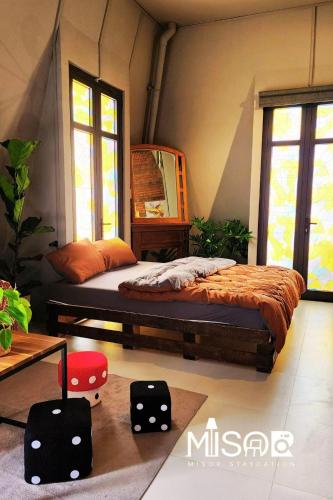 Postel nebo postele na pokoji v ubytování Celine's Loft