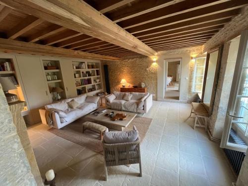 Posezení v ubytování La petite Luzerne 300m de la plage, Cosy et confortable maison rénovée pour 8