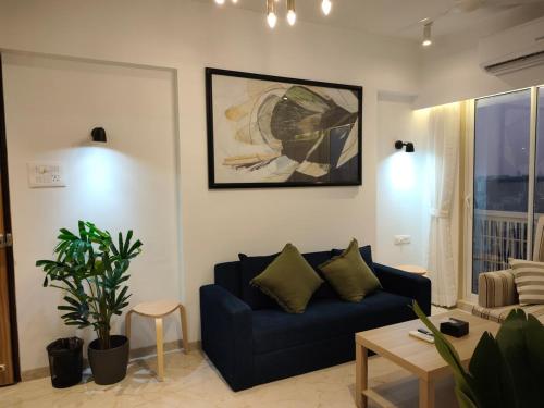 Χώρος καθιστικού στο Anya 2BHK Near BKC - Modern, Calm & Connected