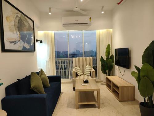 Χώρος καθιστικού στο Anya 2BHK Near BKC - Modern, Calm & Connected