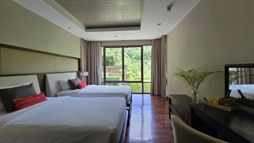 Postel nebo postele na pokoji v ubytování Nammara at Shasa - 2 Bedroom apartment at Laem-Set