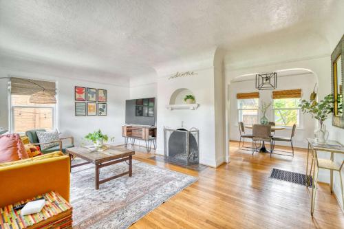 a living room with a couch and a fireplace at Stay Portland - Sedona Vibes in PDX- Walk to Local Shops & Coffee in Portland