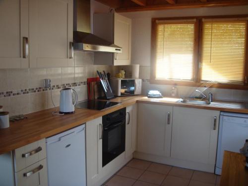 Η κουζίνα ή μικρή κουζίνα στο Chalet Clementine