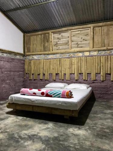 Postel nebo postele na pokoji v ubytování Hostal Tierra de Nubes