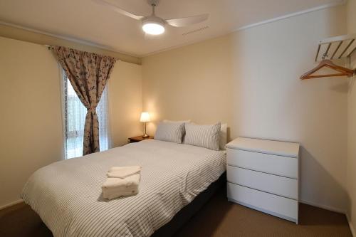 Ένα ή περισσότερα κρεβάτια σε δωμάτιο στο Seabreeze Villa