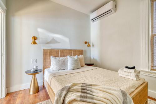 a bedroom with a large bed and a window at Stay Portland - The Charmante Suite- Breweries & Boutiques in Portland