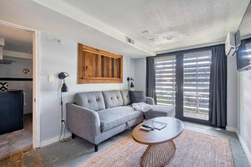 a living room with a couch and a table at Unique Portland Home in Pearl District Sleeps 4 in Portland