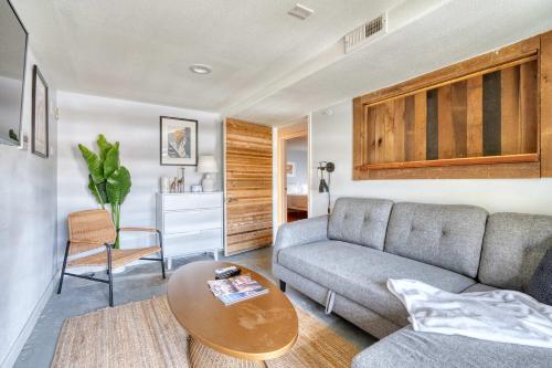 a living room with a couch and a table at Unique Portland Home in Pearl District Sleeps 4 in Portland