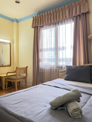 Una cama o camas en una habitación de NamRoom at Margot Jaksa