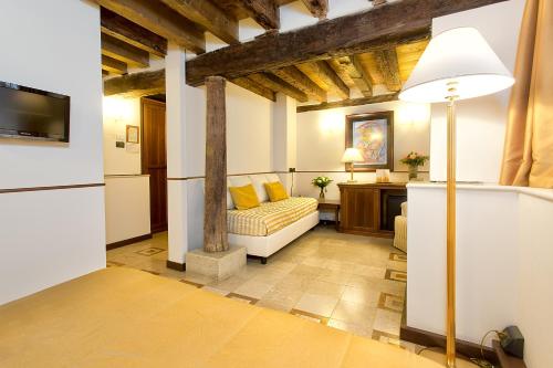 TV a/nebo společenská místnost v ubytování Ca' San Giorgio B&B