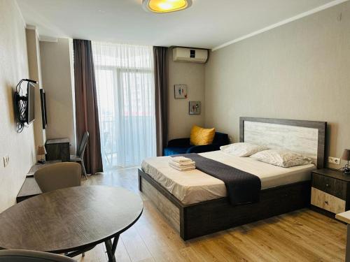 Кровать или кровати в номере Apart Hoteli