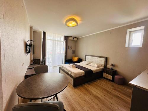 Кровать или кровати в номере Apart Hoteli