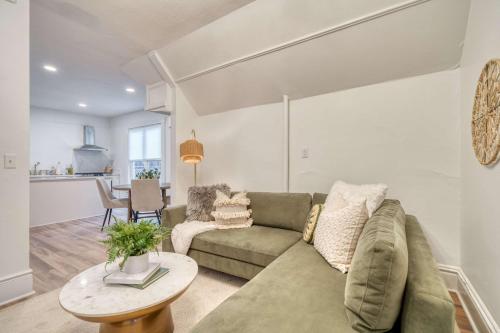 a living room with a couch and a table at Stay Portland - Historic Queen Anne Vernacular - 95 WalkScore in Portland