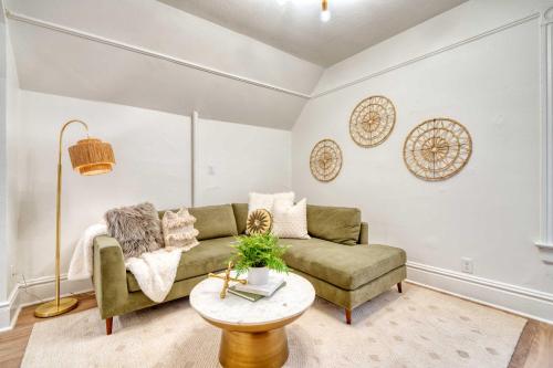 a living room with a couch and a table at Stay Portland - Historic Queen Anne Vernacular - 95 WalkScore in Portland