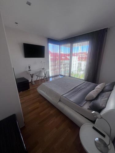 Ένα ή περισσότερα κρεβάτια σε δωμάτιο στο Room Korunní dvur