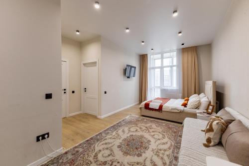 Postel nebo postele na pokoji v ubytování Возле EXPO, есть все настольные игры