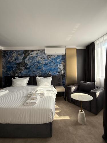 Katil atau katil-katil dalam bilik di Aslan Gold Hotel