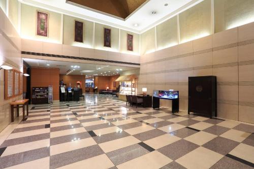 TV a/nebo společenská místnost v ubytování Dai-ichi Hotel Ryogoku