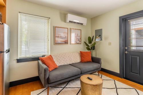 a living room with a couch and a window at Stay Portland - Perfect Portland Micro By Top Shopping & Dinning in Portland