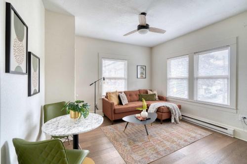 a living room with a couch and a table at Stay Portland - Mt Tabor Retreat - Local Eateries - Shops - Bars in Woodstock