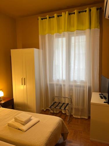 Letto o letti in una camera di Corso Porta Nuova 39