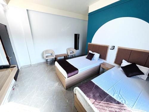 Postel nebo postele na pokoji v ubytování Arka Hotel and Restaurant