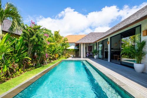 an image of a swimming pool in a villa at Mona Boutique Villas & Spa in Uluwatu