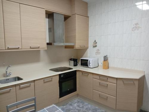 Køkken eller tekøkken på Alojamiento Cervantes