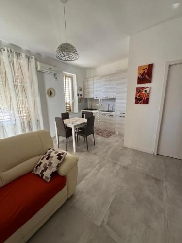 a living room with a couch and a table at Donna Maria in Catanzaro