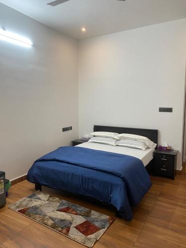 Postel nebo postele na pokoji v ubytování Royce Resort