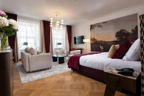 Ένα ή περισσότερα κρεβάτια σε δωμάτιο στο Hotel Palladian