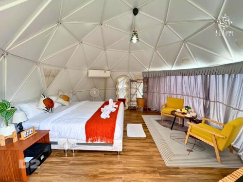 Postel nebo postele na pokoji v ubytování L1 Lanta Resort