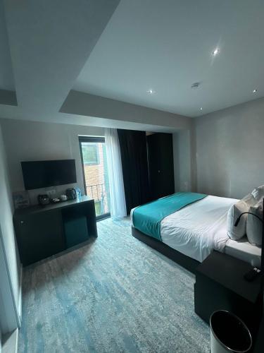 Voodi või voodid majutusasutuse MIT Hotel Tbilisi toas