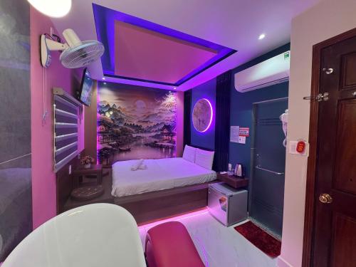 Ένα ή περισσότερα κρεβάτια σε δωμάτιο στο Xuân Hồng Hotel