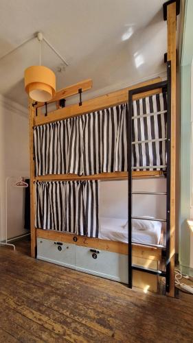a bunk bed in a room with at Rossio Hostel in Lisbon