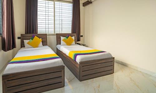 Ένα ή περισσότερα κρεβάτια σε δωμάτιο στο Itsy Hotels Revmantra