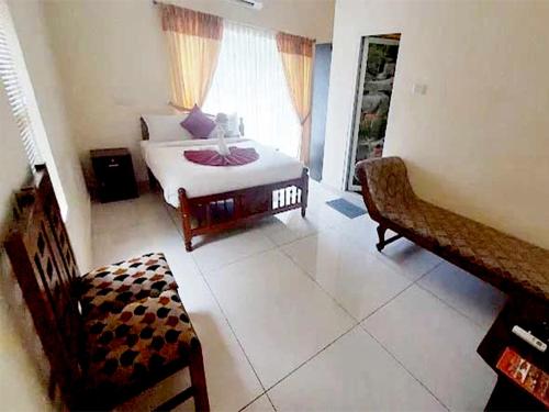 Postel nebo postele na pokoji v ubytování Lake Chill Resort