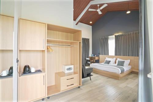 Postel nebo postele na pokoji v ubytování Mansimble Tea Estate Lodge & Camp