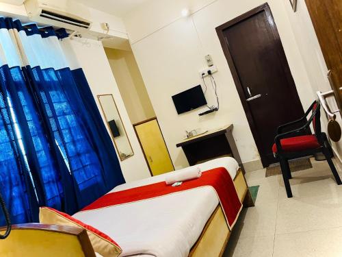 TV a/nebo společenská místnost v ubytování New Hotel Rhino