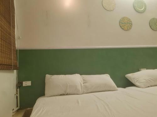 Postel nebo postele na pokoji v ubytování Cute Home