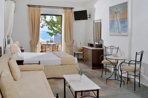 Postel nebo postele na pokoji v ubytování Vasilaras Hotel