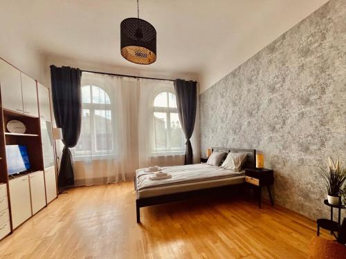 Postel nebo postele na pokoji v ubytování Avotu ApartHotel `self check-in`