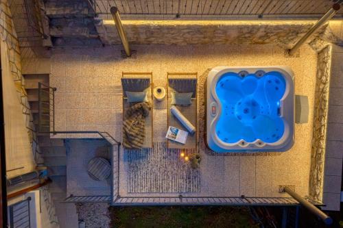 an overhead view of a swimming pool on a building at Hillside Lodge, Boutique & Spa in Lič