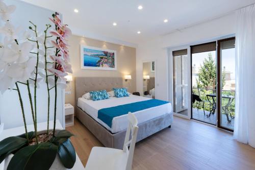 Postel nebo postele na pokoji v ubytování Hotel Kali Sorrento